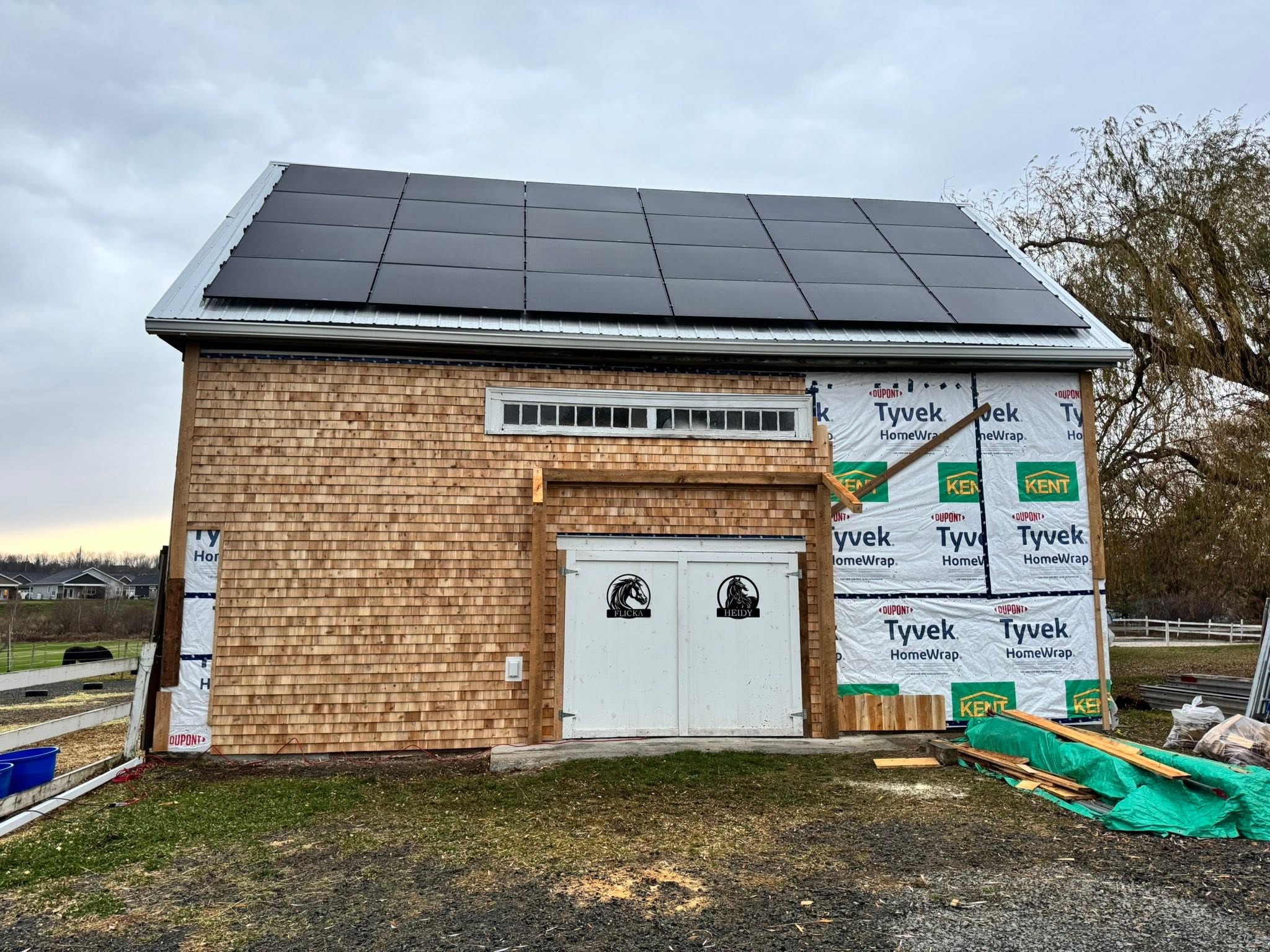 Barn restoration with new cedar siding