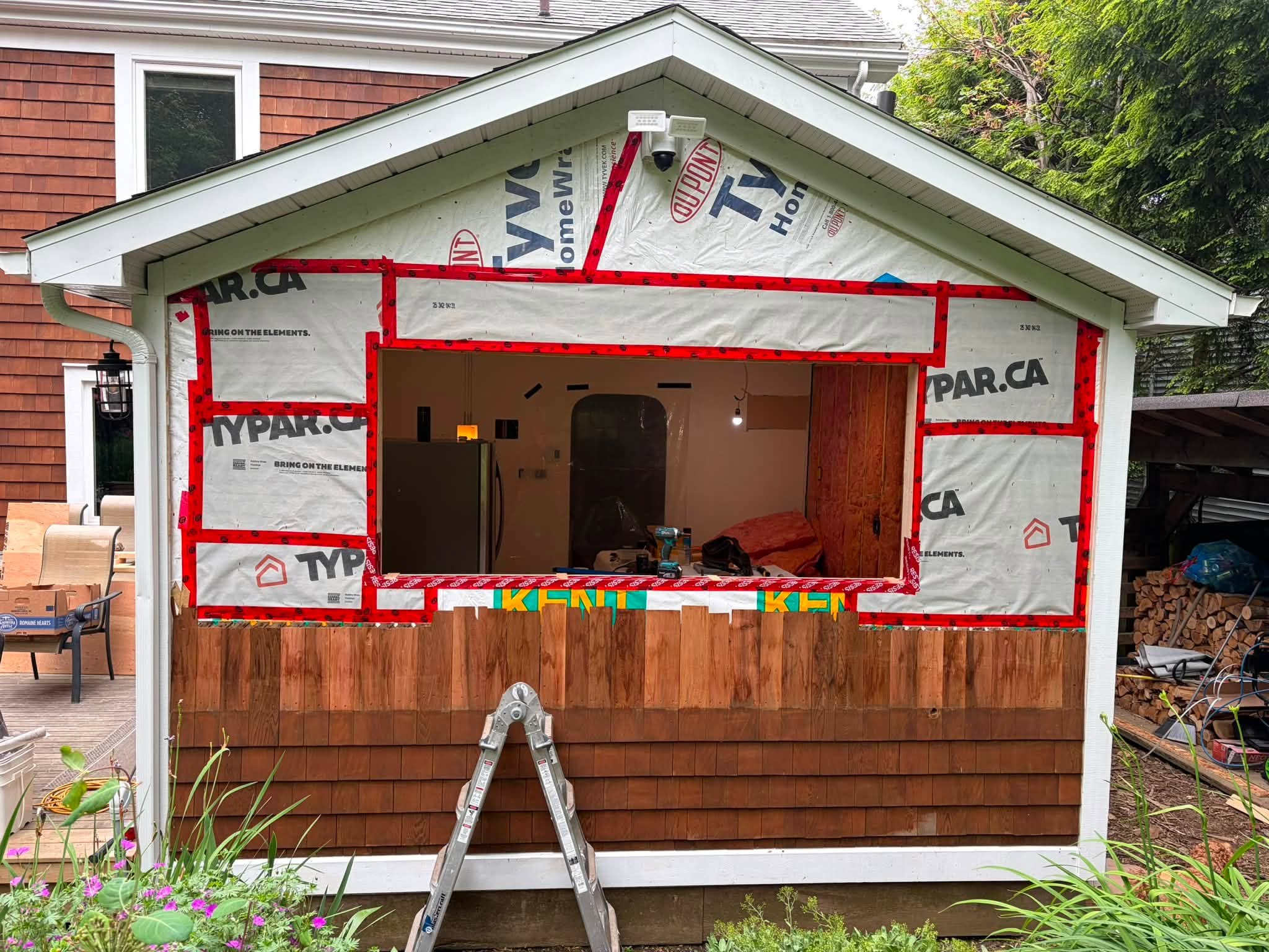 Window opening and cedar siding project
